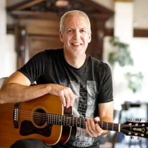 Local Musicain Mike Lucy Asks "So, what makes a songwriter?"