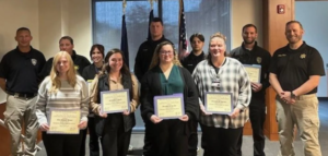 Front row (from left): Kira Nixon (Ontario County), Michelle Davis (Ontario County), Brandee Ellis (Yates County), and Christine Barnes (Ontario County). Back row: Finger Lakes Law Enforcement Academy Training Director Jeffrey Keyser, Brittney Starr (Livingston County), Abigail Miller (Ontario County), Nate Furfaro (Wayne County), Gavin Mott (Wayne County), Ryan Henry (Wayne County), and Ontario County Senior Dispatcher Nathan Martin