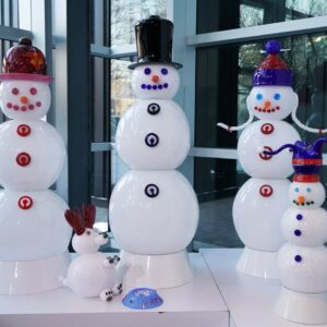 The Corning Museum of Glass is offering a unique winter experience with the unveiling of a giant, glass snow family.