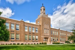 NAPLES, N.Y. — A staff member at Naples Central School District has been placed on administrative leave after a series of social media posts about the fatal shooting of conservative activist Charlie Kirk drew sharp criticism from the community. Kirk, a well-known political commentator and founder of Turning Point USA, was killed Wednesday during an event at a Utah university. Shortly after, screenshots began circulating of posts allegedly made by a district employee. The posts included profanity directed at Trump supporters and Kirk’s followers, called Kirk a Nazi, and shared an image of a shirt with the words “Is He Dead Yet?” The employee is identified as a teacher on the district’s website. Following complaints from parents and community members, school leaders confirmed the staff member was placed on leave while the matter is reviewed. In a statement Thursday, the district underscored its commitment to respectful dialogue and community values, writing: “It is comforting to know the NCS community values kindness, empathy, compassion, and civility. As a district, we stand with you in doing all we can to uphold these values, which are essential to model for our students.” Officials said no further comment will be provided until the internal investigation is complete.